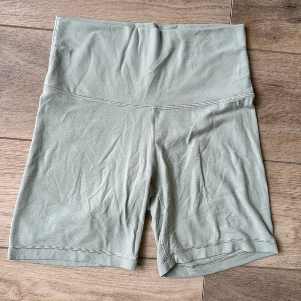 Aritzia TNA biker shorts — light green